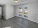 Bright room with french doors, neutral walls and modern vinyl plank flooring at 548 47Th N Ave, St Petersburg, FL 33703