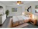 Stylish main bedroom featuring a comfortable bed, modern decor, and ample natural light at 548 47Th N Ave, St Petersburg, FL 33703