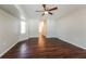 Primary bedroom featuring wood flooring and access to bathroom at 1090 Yarmouth St, Port Charlotte, FL 33952