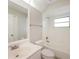 Clean bathroom with a shower/tub combo, vanity, and updated hardware at 1090 Yarmouth St, Port Charlotte, FL 33952