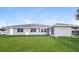 Newly built home with a large backyard and modern facade at 1090 Yarmouth St, Port Charlotte, FL 33952