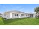 Newly built home with a large backyard and modern facade at 1090 Yarmouth St, Port Charlotte, FL 33952