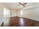 Spacious bedroom with wood flooring and ceiling fan at 1090 Yarmouth St, Port Charlotte, FL 33952