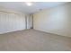 Unfurnished bedroom with plush carpet and double door closet at 3444 97Th E Ln, Palmetto, FL 34221