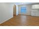 Dining area with laminate flooring, window, and view of the kitchen at 3444 97Th E Ln, Palmetto, FL 34221