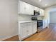 Modern kitchen with white cabinets and stainless steel appliances at 3444 97Th E Ln, Palmetto, FL 34221