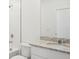 Bathroom features granite vanity, white sink, tile flooring and shower with sleek chrome fixtures at 145 Lazy Shore Dr, Nokomis, FL 34275
