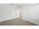 Bedroom featuring plush carpet and a large closet at 145 Lazy Shore Dr, Nokomis, FL 34275