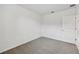 Simple bedroom with neutral walls and carpet at 156 Lazy Shore Dr, Nokomis, FL 34275