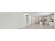 Spacious living room with open floor plan and tile flooring at 156 Lazy Shore Dr, Nokomis, FL 34275