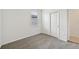 Bright bedroom with window and double-door closet at 156 Lazy Shore Dr, Nokomis, FL 34275