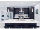 Modern kitchen with stainless steel appliances and island at 27367 Chinquapin Dr, Punta Gorda, FL 33955