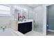 Elegant bathroom with double vanity and walk-in shower at 27367 Chinquapin Dr, Punta Gorda, FL 33955