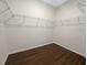 Large walk-in closet with wire shelving at 12545 Ryegrass Loop, Parrish, FL 34219