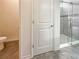 Bathroom with toilet and walk-in shower at 12545 Ryegrass Loop, Parrish, FL 34219