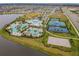 Aerial view of community pool, tennis, and basketball courts at 5520 Limelight Dr, Apollo Beach, FL 33572