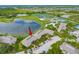 Community features a lake, pool, and tennis courts at 29200 Bay Hollow Dr # 3290/3292, Wesley Chapel, FL 33543