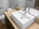 Modern bathroom with a rectangular undermount sink and dark vanity at 11158 Golden Silence Dr, Riverview, FL 33579