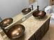 Bathroom boasts dual sinks with bronze vessel sinks and granite vanity at 11158 Golden Silence Dr, Riverview, FL 33579