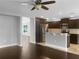 Modern kitchen with stainless steel appliances and dark cabinets at 11158 Golden Silence Dr, Riverview, FL 33579