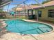 Inviting kidney-shaped pool with a screened enclosure at 11158 Golden Silence Dr, Riverview, FL 33579