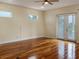 Bright bedroom with hardwood floors and French doors at 1340 Apollo Beach S Blvd, Apollo Beach, FL 33572