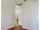 Spacious bedroom with hardwood floors and access to a balcony at 1340 Apollo Beach S Blvd, Apollo Beach, FL 33572