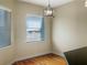 Bright dining area with hardwood floors and large window at 1340 Apollo Beach S Blvd, Apollo Beach, FL 33572