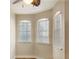 Bedroom with hardwood floors and arched windows at 1340 Apollo Beach S Blvd, Apollo Beach, FL 33572