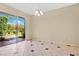 Dining room with sliding doors leading to the backyard at 18509 Bittern Ave, Lutz, FL 33558