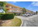 Building exterior with parking and landscaping at 6400 46Th N Ave # 102, Kenneth City, FL 33709