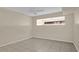 Spacious bedroom with tile flooring and ceiling fan at 6400 46Th N Ave # 102, Kenneth City, FL 33709