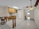 Kitchen boasts ample cabinetry and a breakfast bar at 6400 46Th N Ave # 102, Kenneth City, FL 33709