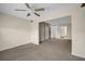 Large living room with ceiling fan and access to other rooms at 6400 46Th N Ave # 102, Kenneth City, FL 33709