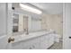 Clean bathroom with vanity, toilet and shower/tub at 6400 46Th N Ave # 102, Kenneth City, FL 33709