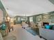 Open living space showcasing a fireplace and stylish furnishings at 5462 Chanteclaire # 65, Sarasota, FL 34235