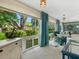 Relaxing sunroom with backyard views and comfortable seating at 5462 Chanteclaire # 65, Sarasota, FL 34235