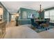 Charming dining room with chandelier and view to kitchen at 5462 Chanteclaire # 65, Sarasota, FL 34235