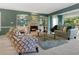 Elegant living room with a fireplace and comfy seating at 5462 Chanteclaire # 65, Sarasota, FL 34235