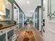 Bright and airy entryway with hardwood floors and decorative accents at 5462 Chanteclaire # 65, Sarasota, FL 34235