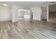 Open concept living and kitchen area with stairs at 1052 Longfellow Cir, Sarasota, FL 34243