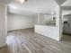 Open living area with kitchen island and view to patio at 1052 Longfellow Cir, Sarasota, FL 34243