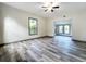 Bright living room featuring hardwood floors and an open floor plan at 210 15Th E St, Bradenton, FL 34208