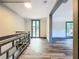 Hallway with a view into another room and access to an outdoor space at 210 15Th E St, Bradenton, FL 34208