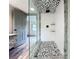 Spa-like bathroom with a large walk-in shower and mosaic tile at 210 15Th E St, Bradenton, FL 34208