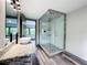 Updated bathroom with a large walk-in shower and granite countertop at 210 15Th E St, Bradenton, FL 34208