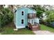Charming two-story house with a deck and fenced backyard at 210 15Th E St, Bradenton, FL 34208