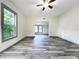 Open living room with hardwood floors and natural light at 210 15Th E St, Bradenton, FL 34208