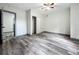 Spacious bedroom with ceiling fan and large closet at 210 15Th E St, Bradenton, FL 34208
