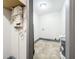 Laundry room with tile floor, plumbing, and electrical hookups at 210 15Th E St, Bradenton, FL 34208